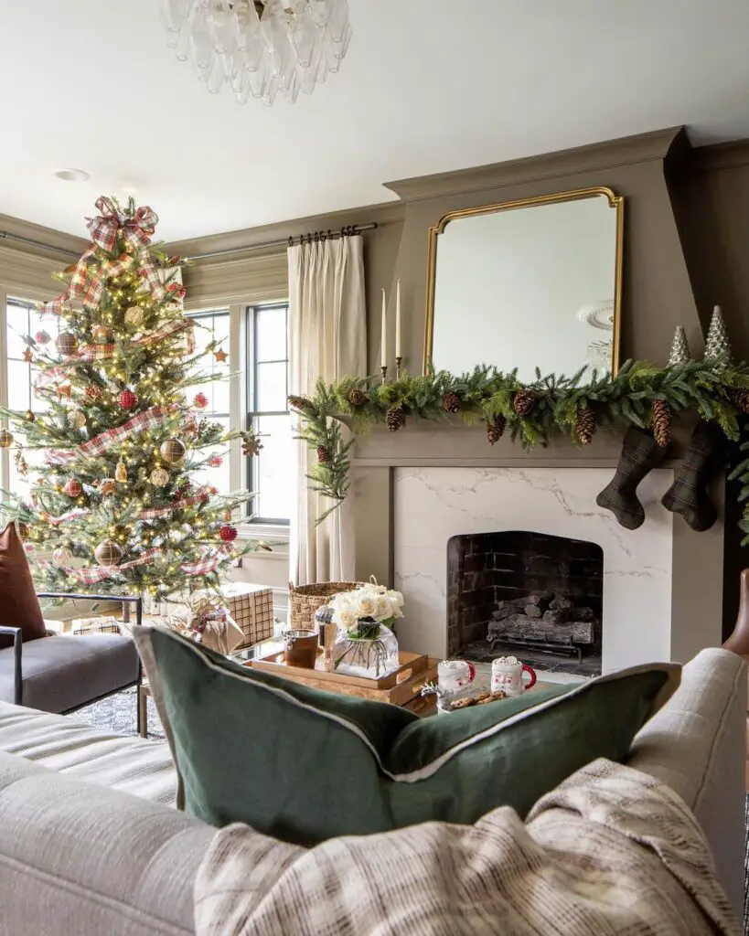 Festive living room with Christmas tree, fireplace