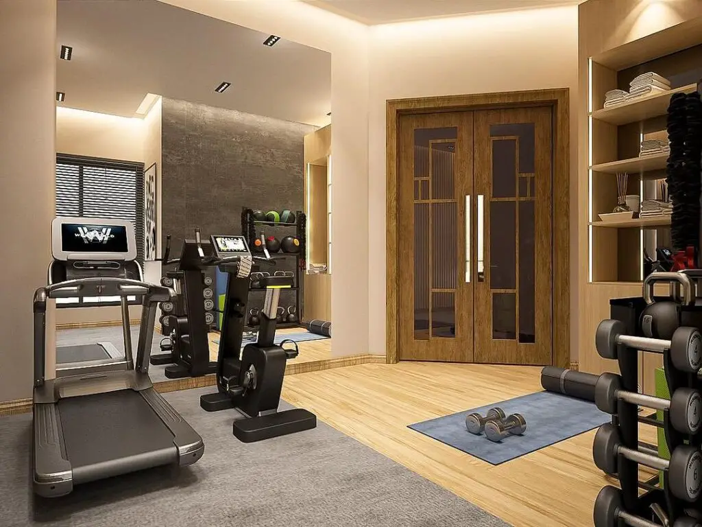 Elegant home gym with treadmill and wooden accents