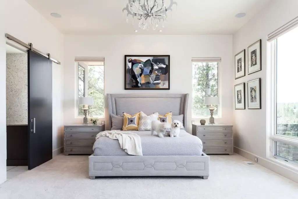 Elegant gray bedroom with crystal chandelier