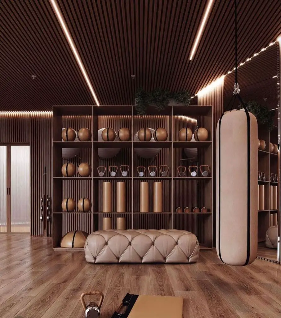 Elegant home gym with brown tones and organized equipment storage