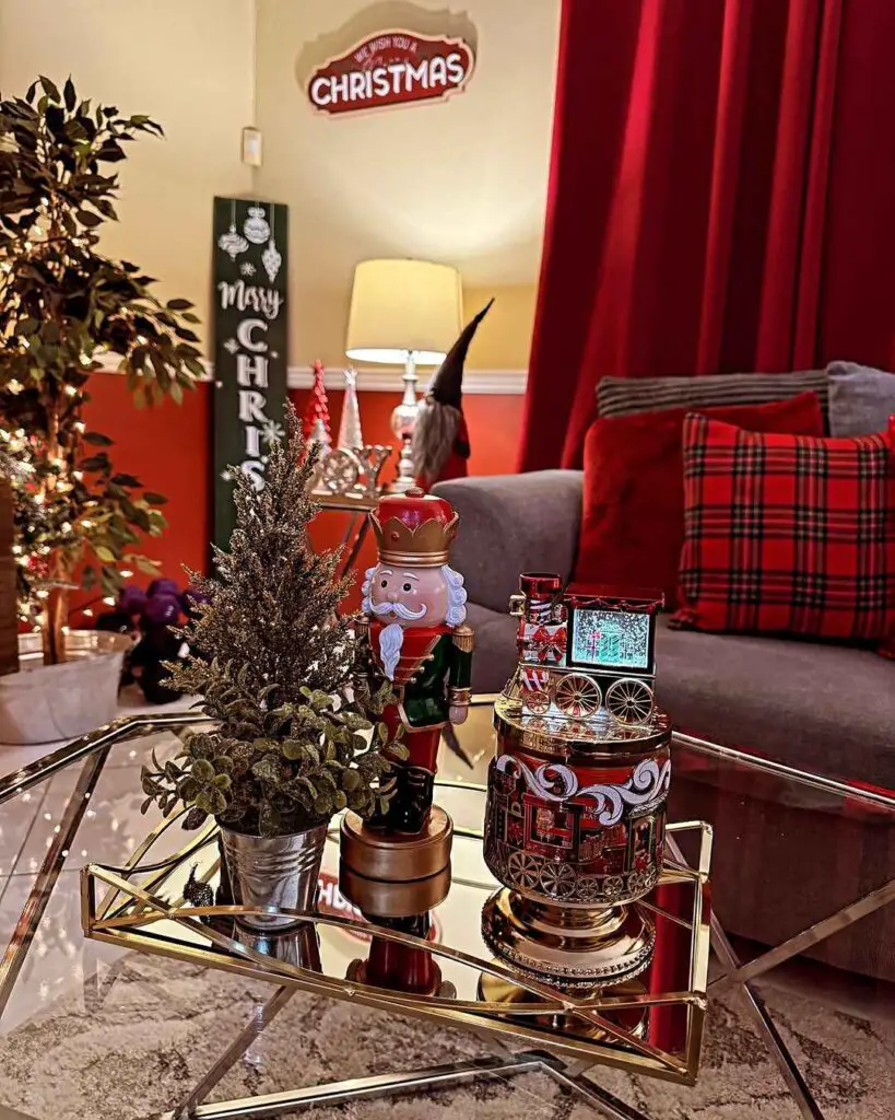 Festive living room with small decorated tree and whimsical decor.