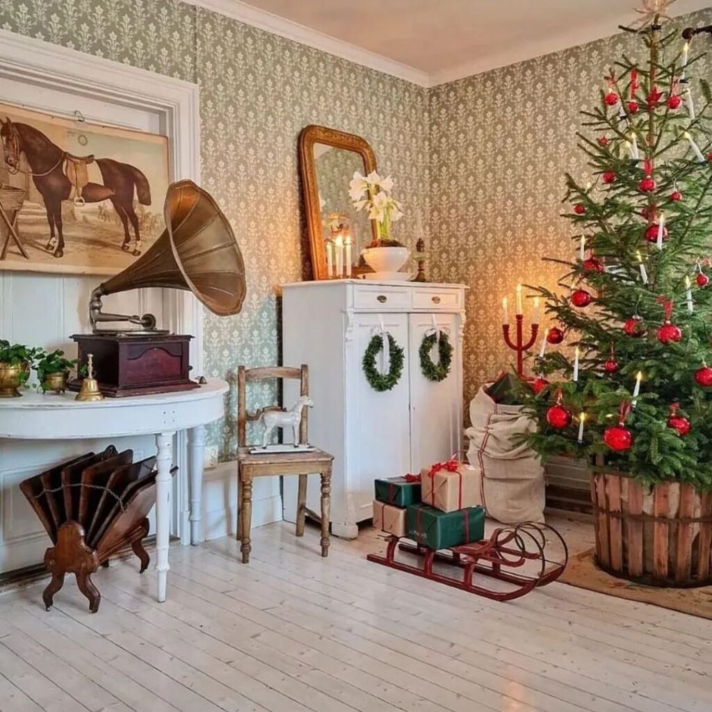 Vintage-style living room decorated with Christmas tree and antiques.