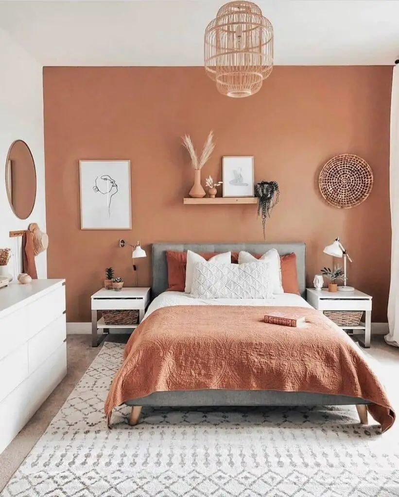Bedroom with peach walls and boho-style decor