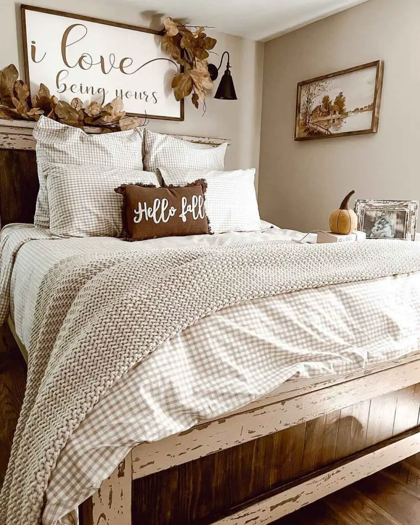 Cozy bed with fall decor and rustic elements