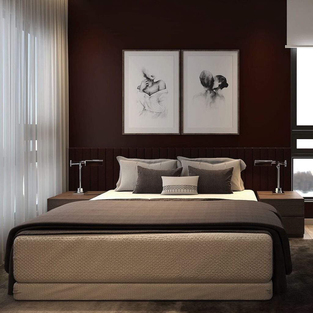 Modern bedroom with dark walls and artistic portraits