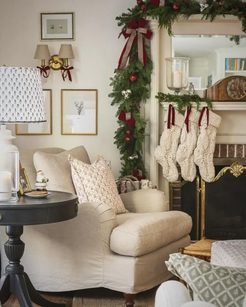 Cozy living room with festive garland, comfortable armchair, and classic Christmas decor