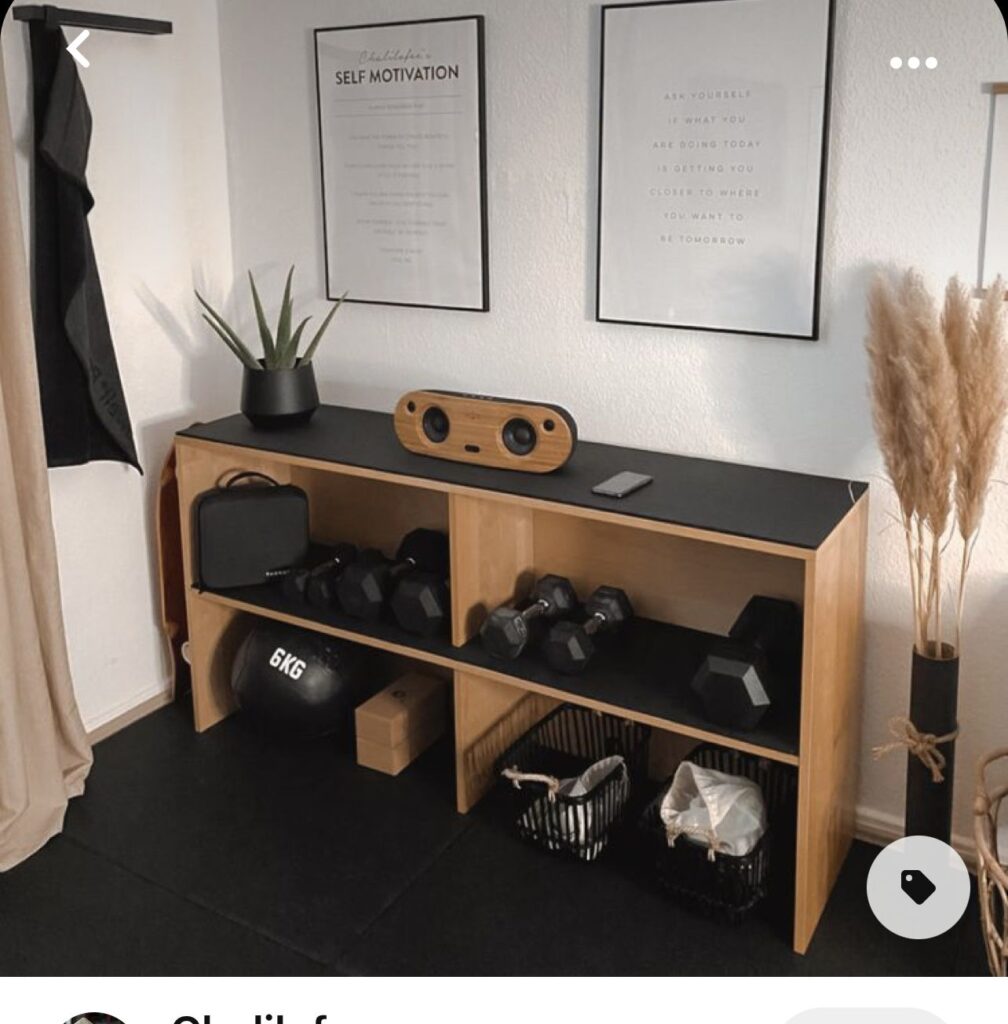 Stylish home gym corner with wooden storage and motivational posters