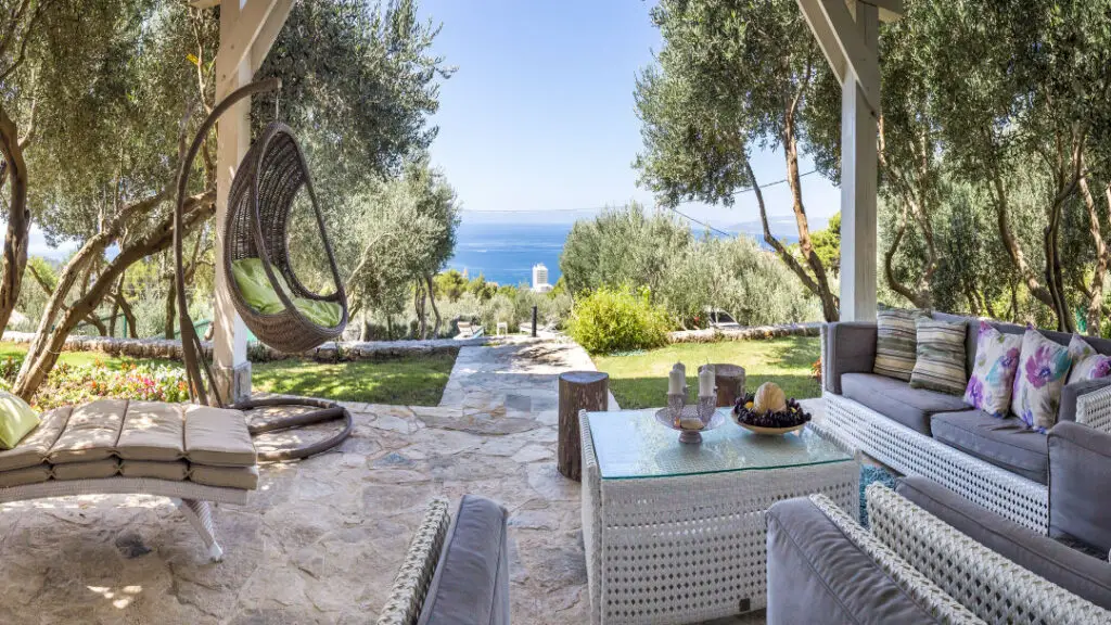 Luxurious seaside patio with Mediterranean garden view