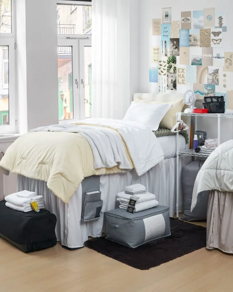 Dorm room with beach-themed wall art and smart storage solutions