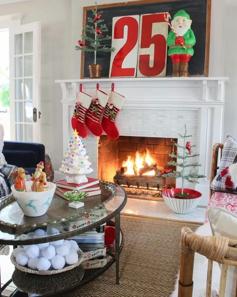 Christmas living room with fireplace and "25" on mantel