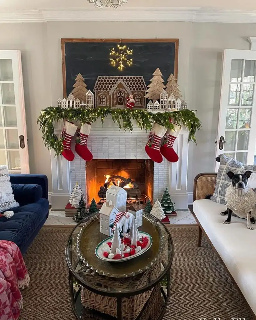 Festive living room with decorated fireplace and dog