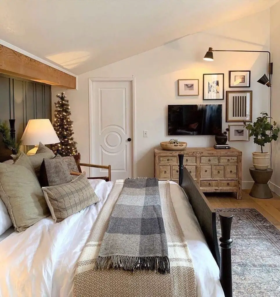Cozy bedroom with vaulted ceiling and rustic decor
