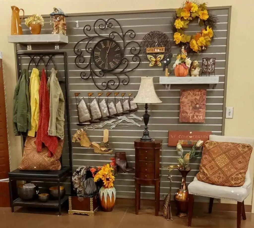 Autumn-themed entryway with gray wall and colorful decor
