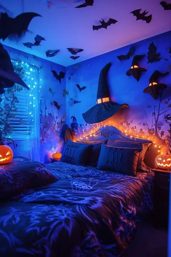 Spooky blue bedroom with bats and witch hat