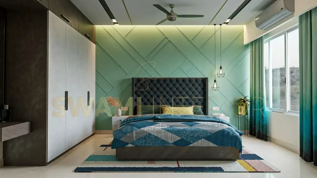 Mint green bedroom with geometric wall navy headboard and teal accents
