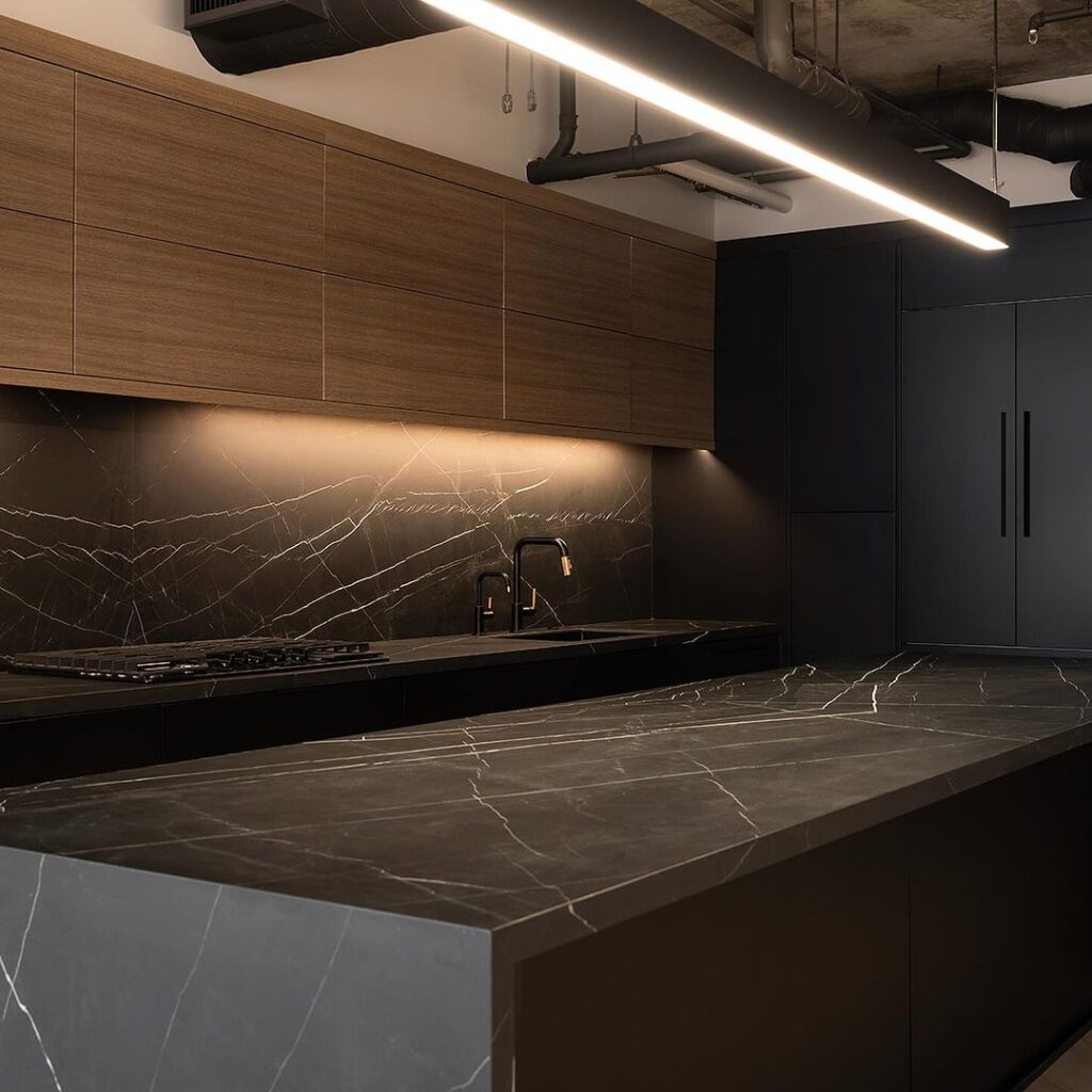Modern kitchen with wood and black cabinets marble surfaces