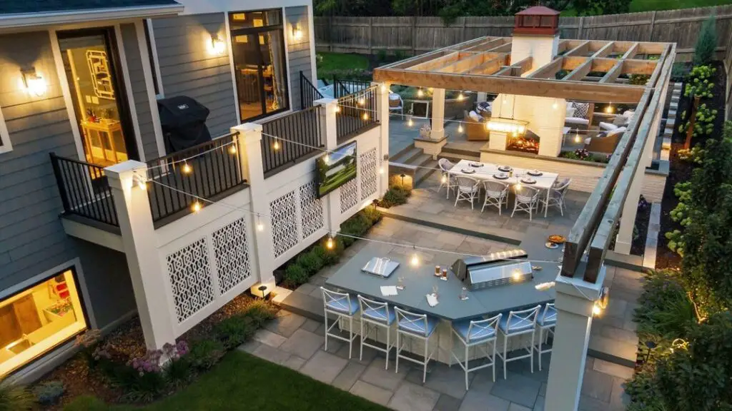 Multi-level patio with outdoor kitchen and dining