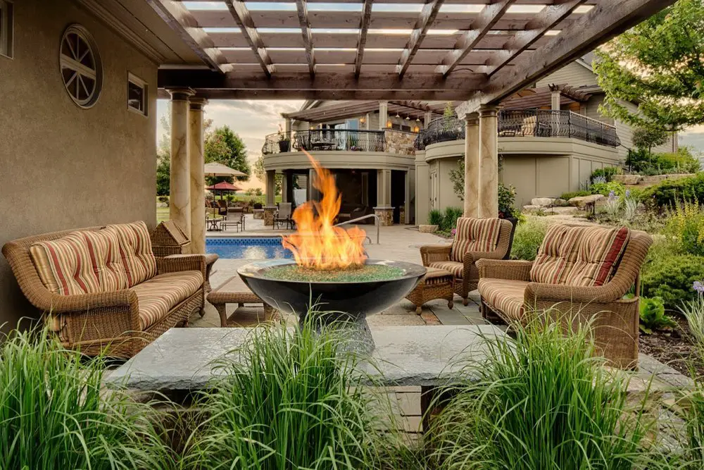 Outdoor patio with fire pit pool and pergola