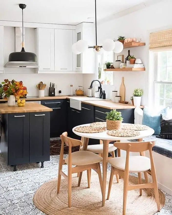 Modern kitchen with contrasting cabinets and dining nook