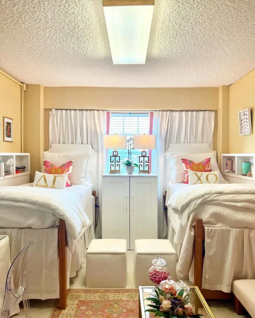 Symmetrical dorm room with twin beds and coordinated decor.