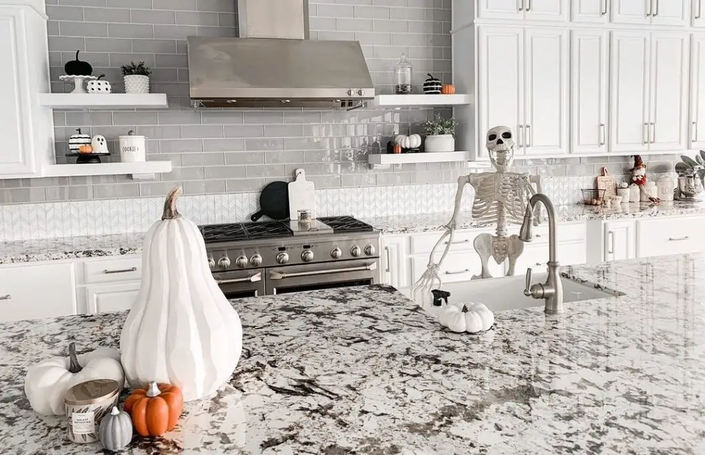 Modern kitchen with Halloween decor and skeleton