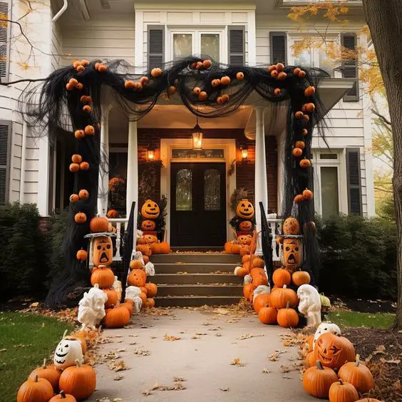 Porch decorated with pumpkins and black netting