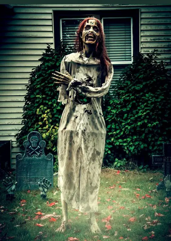 Tall skeleton ghost figure in white dress on suburban lawn