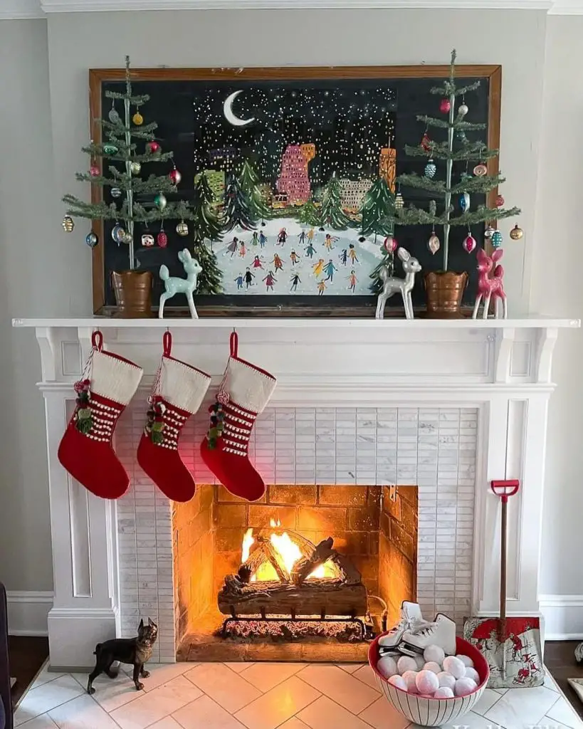 Fireplace with chalk art winter scene and festive decorations