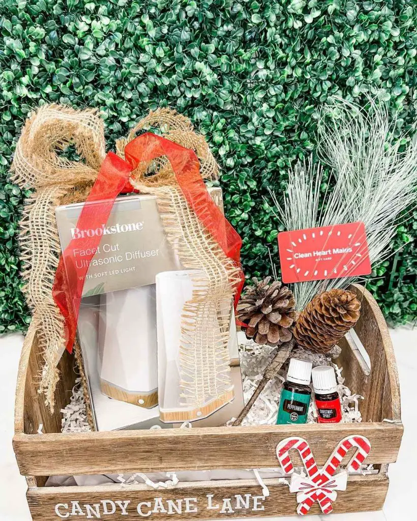 Holiday gift crate with diffuser essential oils and festive decorations