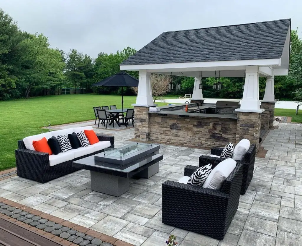 Outdoor patio with kitchen pavilion and lounge area