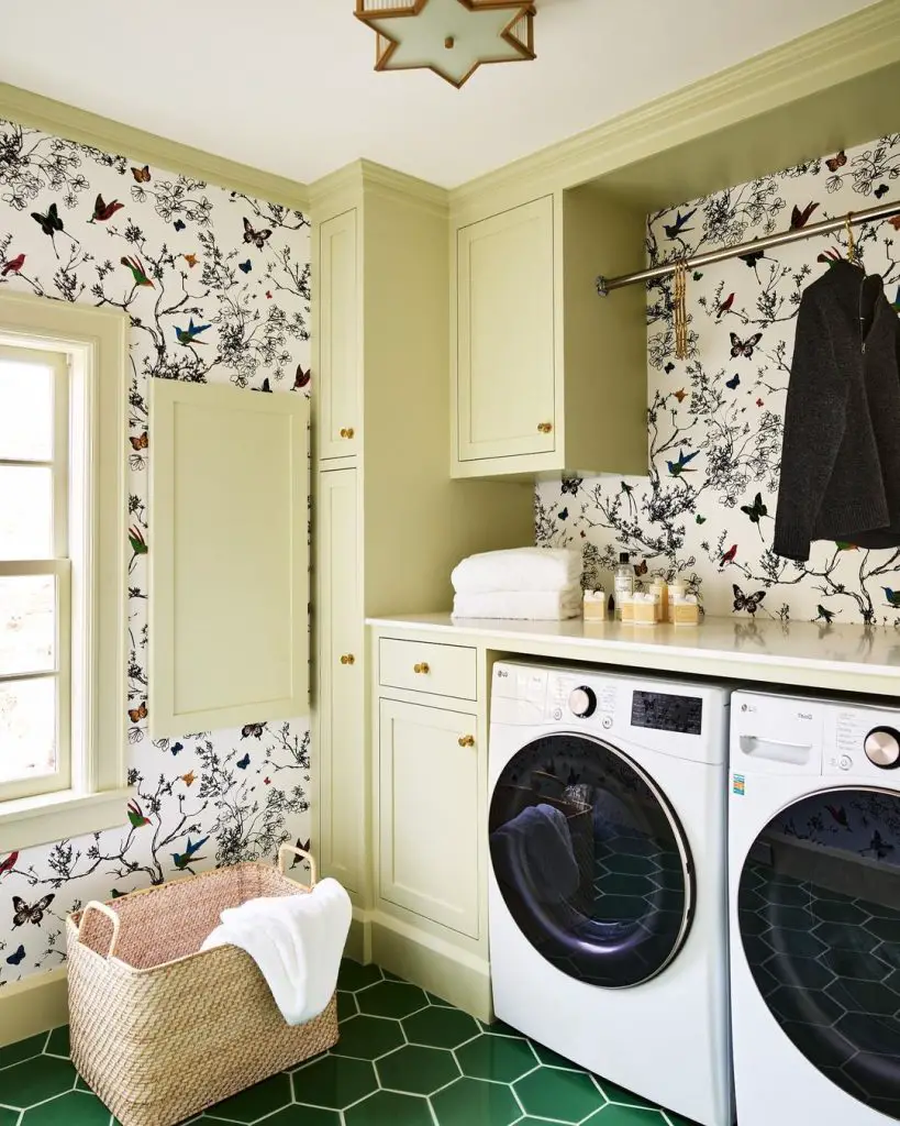 Laundry room with butterfly wallpaper and green accents