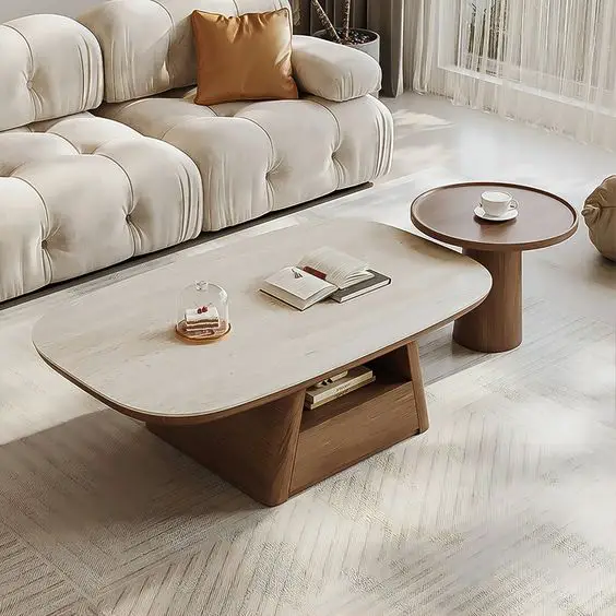 Stylish living area features modern furniture and contemplative coffee table arrangements.