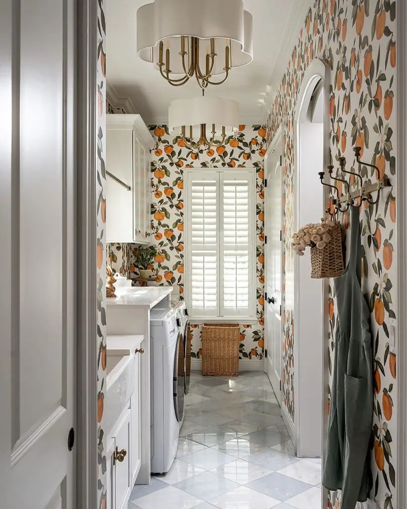 Narrow laundry room with orange fruit wallpaper