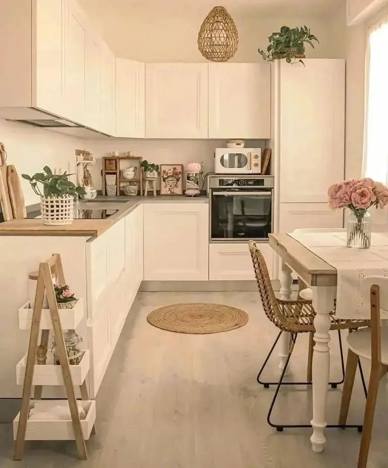White kitchen with rustic accents and small dining area