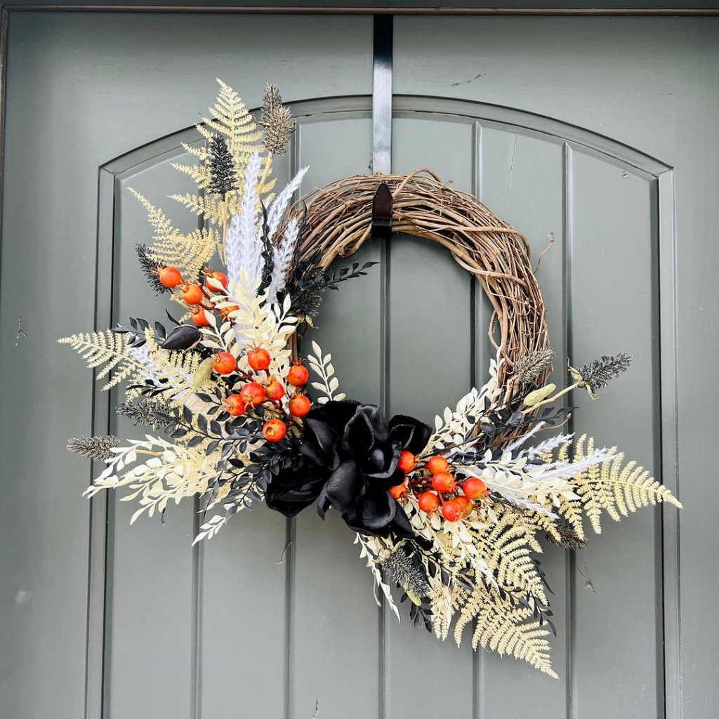 Elegant fall wreath with ferns and berries