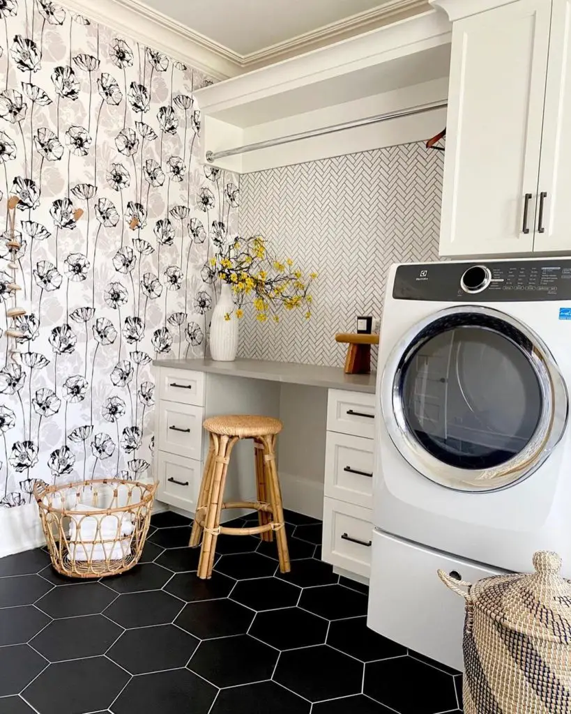 Stylish laundry room with floral wallpaper