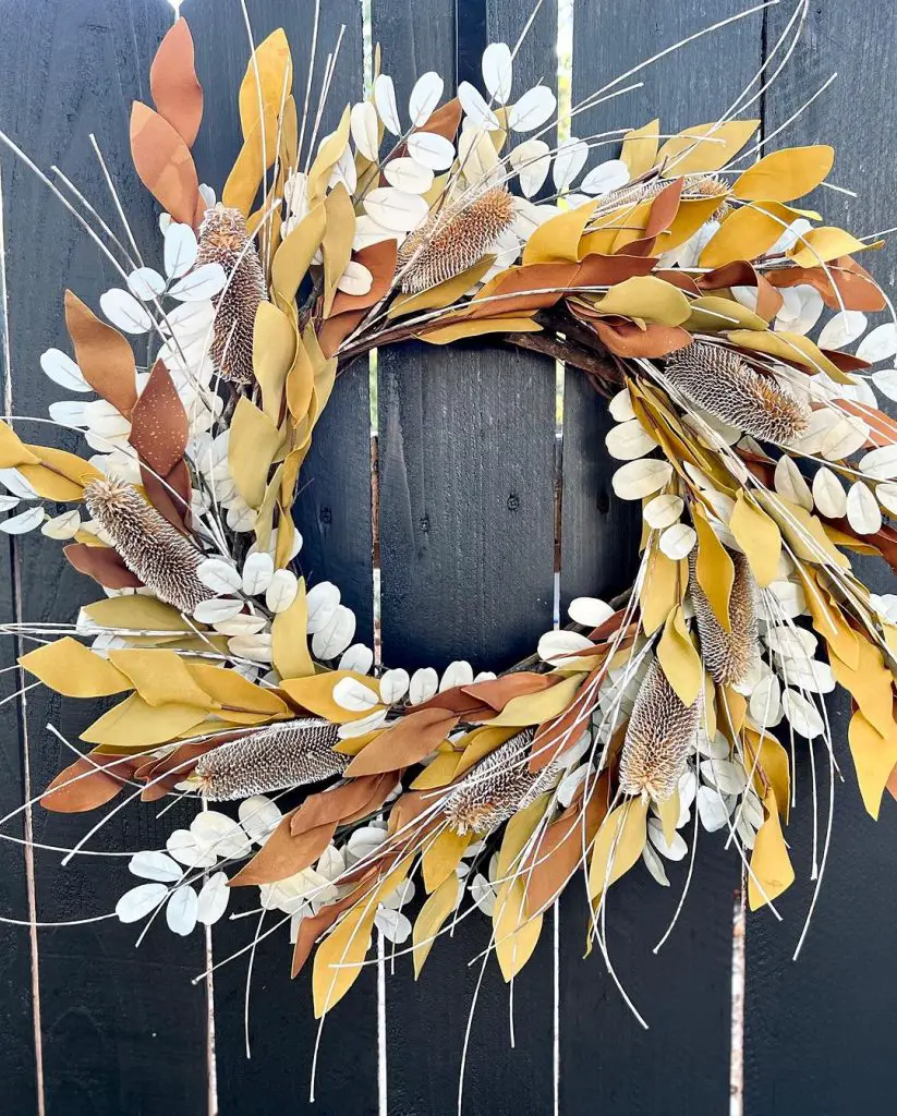 Elegant wreath with white flowers and silver ferns