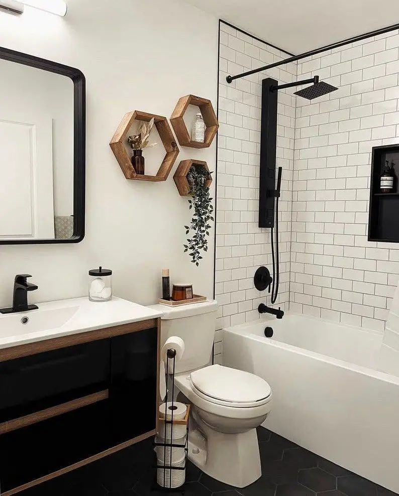 Monochrome bathroom with wooden hexagon shelves and black fixtures