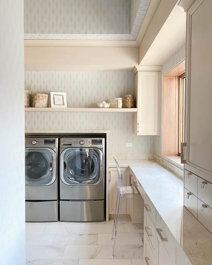 Elegant laundry room with high-end appliances
