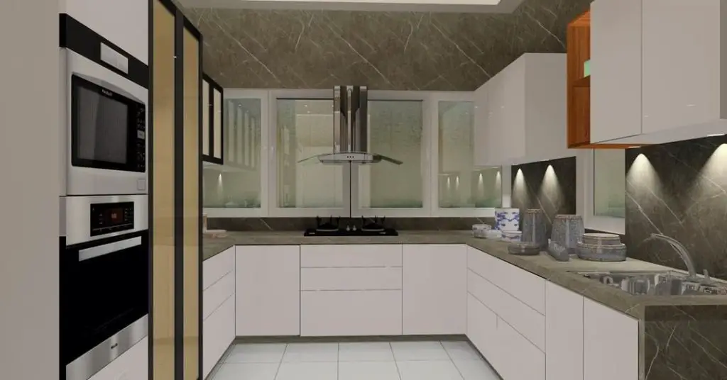 Modern U-shaped kitchen with white cabinets and grey marble accents
