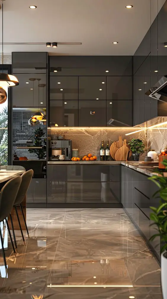 Modern dark kitchen with lit marble backsplash and reflective floors