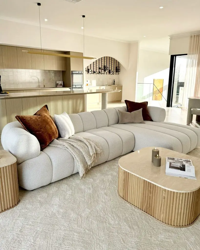 Modern living room with curved sectional sofa
