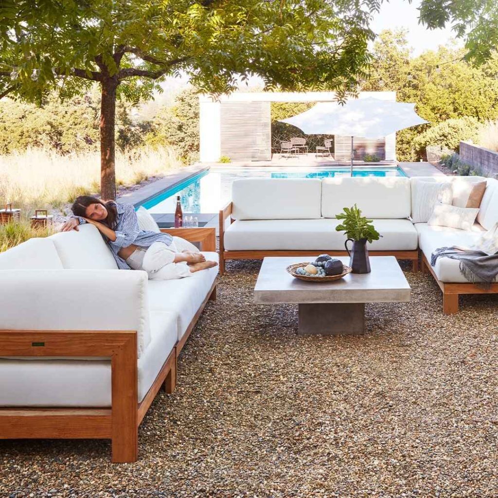 Luxurious poolside lounge with modern furniture