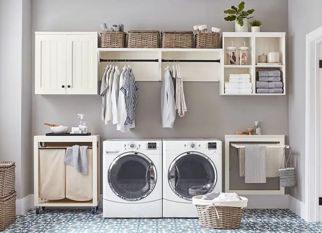 Stylish laundry room with ample storage and patterned floor
