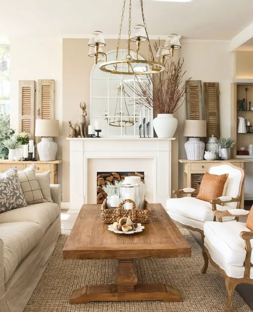 Rustic living room with wooden trestle coffee table and white fireplace