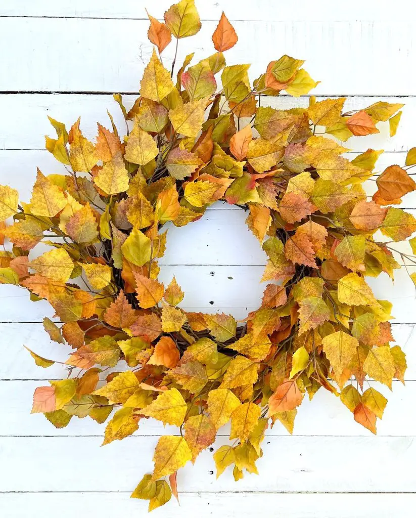 Halloween wreath with skulls and vibrant flowers