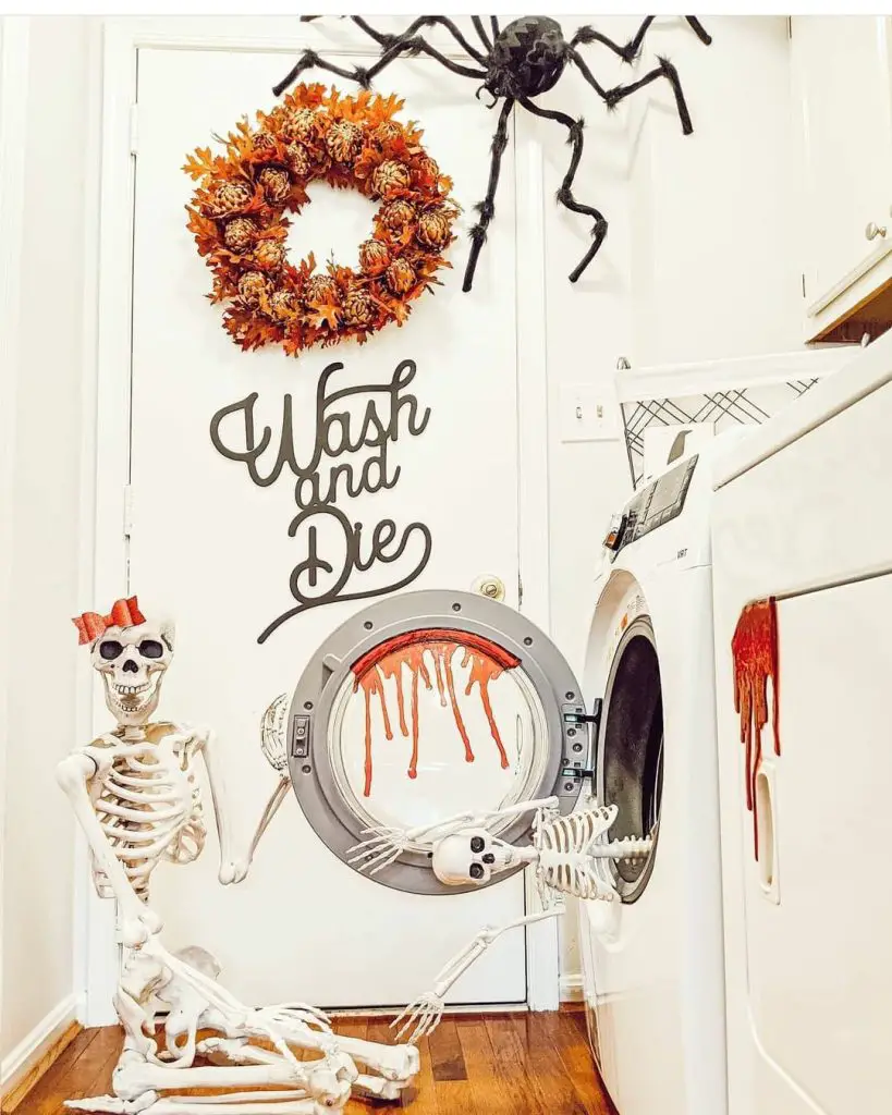 Halloween decorated laundry room with skeleton and bloody washing machine