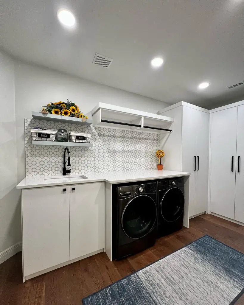 Bright laundry room with sunflowers and patterned backsplash