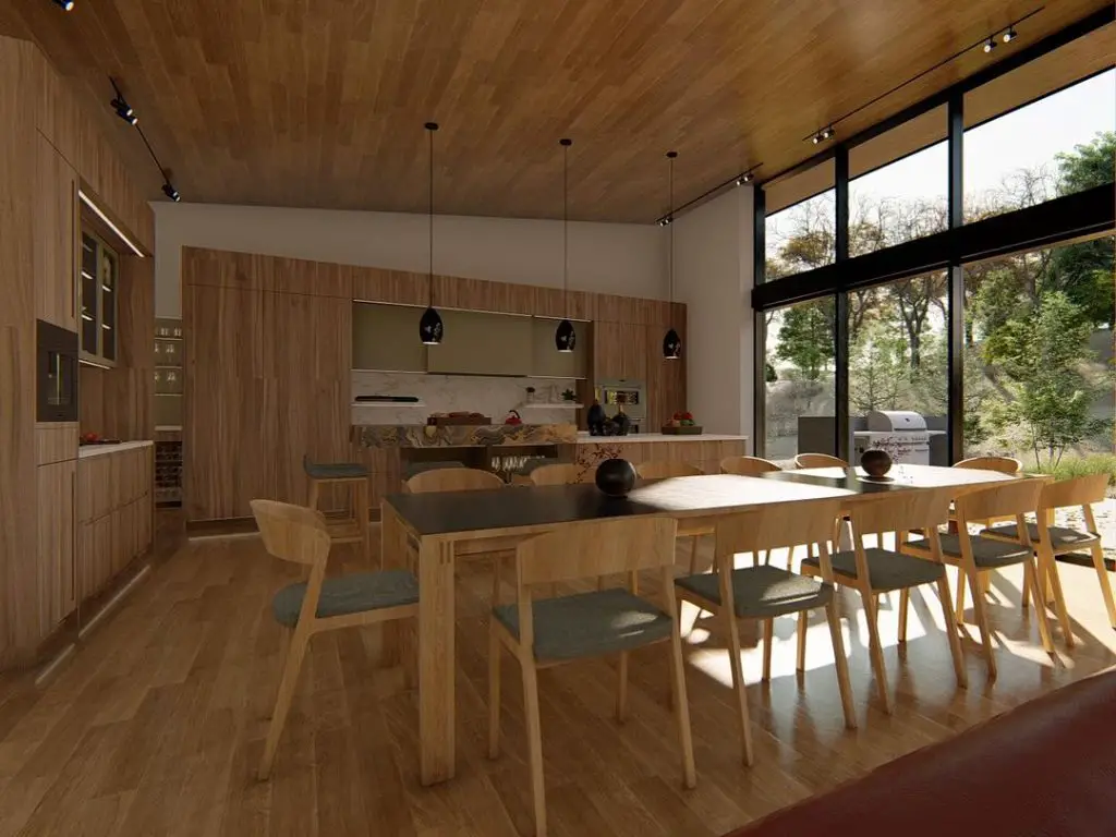 Modern wooden kitchen with large windows and long dining table