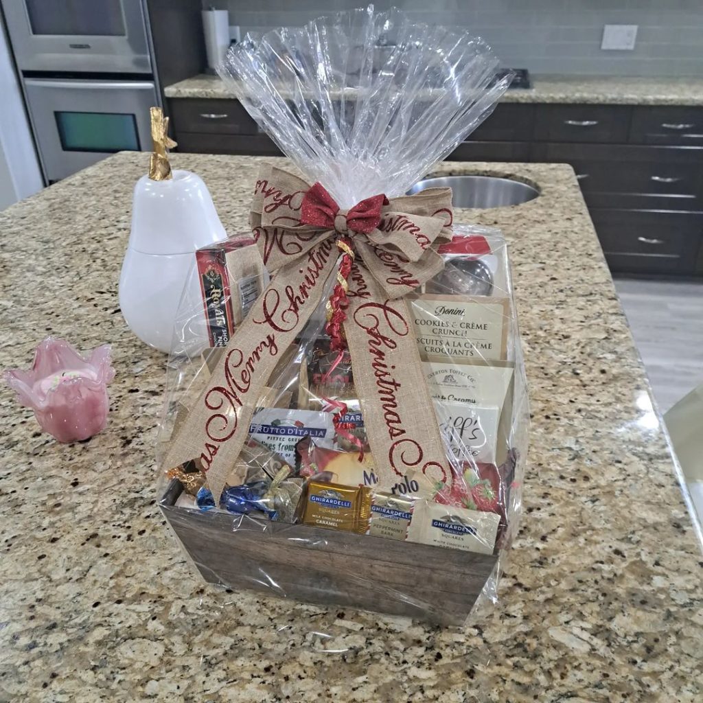 Christmas gift box with sweets chocolates and decorations